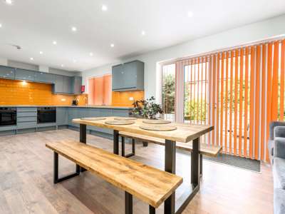 OX Living is proud to present this high-quality 8-bedroom co-living property, perfect for working professionals looking for stylish, stress-free living. image