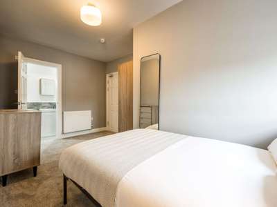 OX Living is proud to present this high-quality 9-bedroom co-living property, perfect for working professionals looking for stylish, stress-free living. image