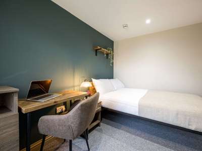 OX Living is proud to present this high-quality 11-bedroom co-living property, perfect for working professionals looking for stylish, stress-free living. image
