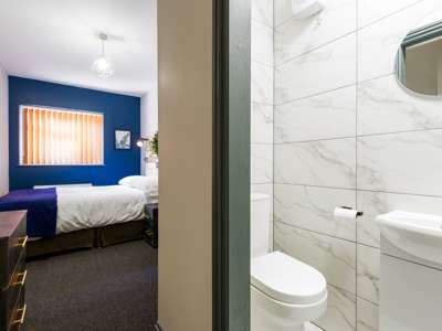 OX Living is proud to present this high-quality 8-bedroom co-living property, perfect for working professionals looking for stylish, stress-free living. image