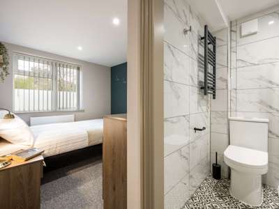 OX Living is proud to present this high-quality 11-bedroom co-living property, perfect for working professionals looking for stylish, stress-free living. image